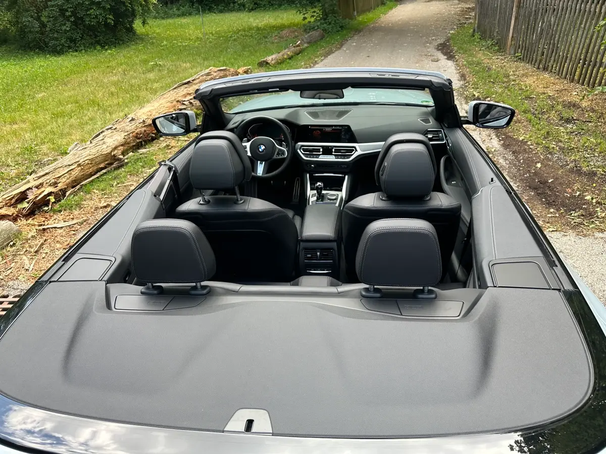 BMW 430i Cabrio 2023, rear view — Cannes Lux Car Rental, Cannes. BMW 430i Cabrio in Cannes BMW 430i Cabrio rental in Cannes offers an open-top 2023…