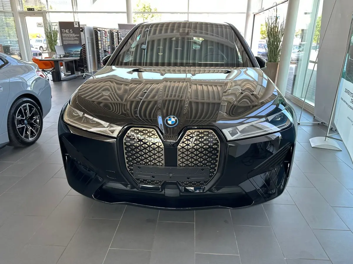 BMW IX M60 2023, front view — Cannes Lux Car Rental, Cannes. BMW IX M60 in Cannes BMW IX M60 rental in Cannes secures a 2023 SUV delivering 619…