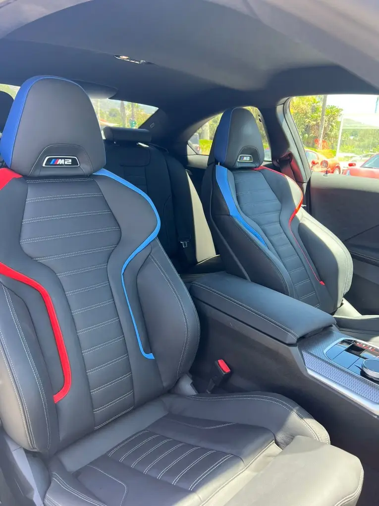 BMW M2 2024, rear view — Cannes Lux Car Rental, Cannes. BMW M2 in Cannes BMW M2 rental in Cannes gives drivers access to a 2024 sport model…