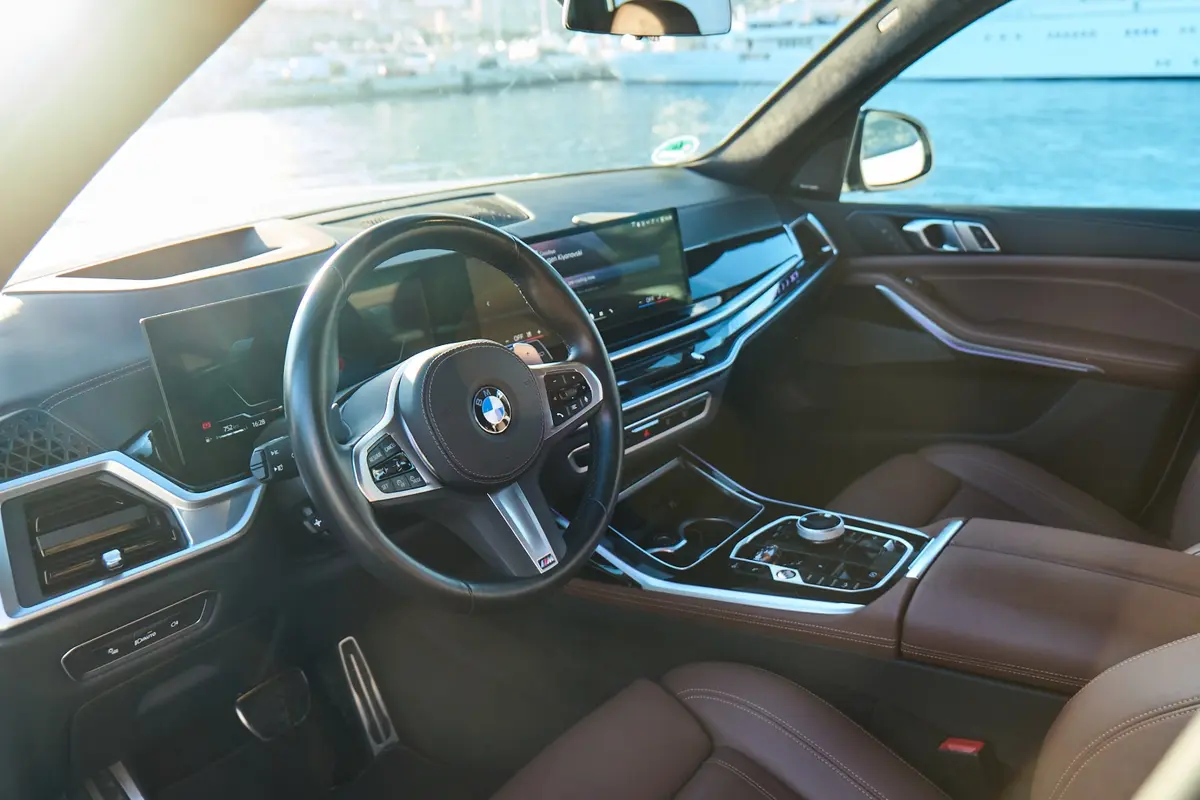 BMW X7 40d M 2024, interior — Cannes Lux Car Rental, Cannes. BMW X7 40d M in Cannes Renting a BMW X7 40d M in Cannes secures a 2024 SUV configured…