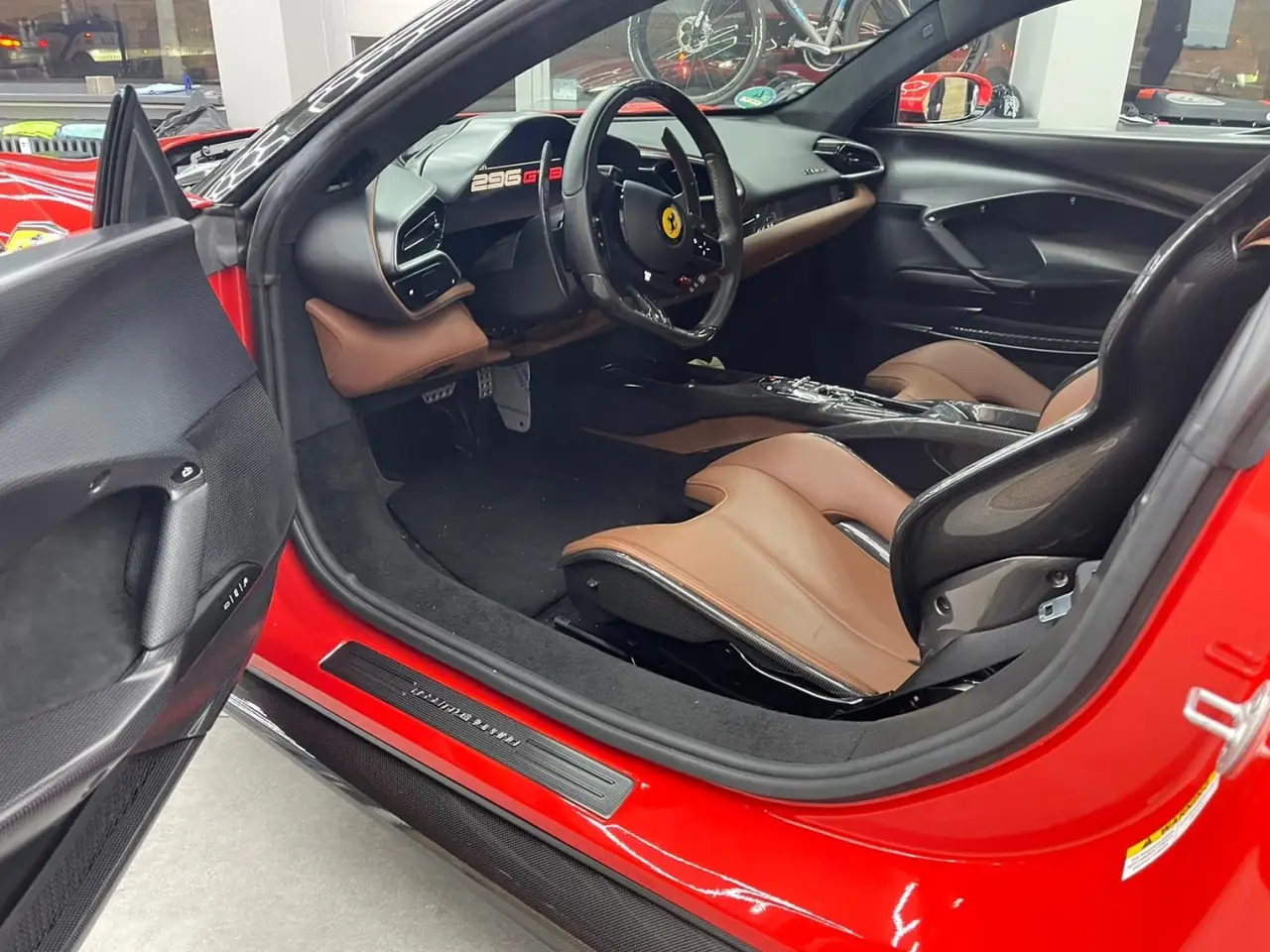 Ferrari 296 GTB 2023, front view — Cannes Lux Car Rental, Cannes. Ferrari 296 GTB in Cannes Ferrari 296 GTB rental in Cannes provides access to a 2023…