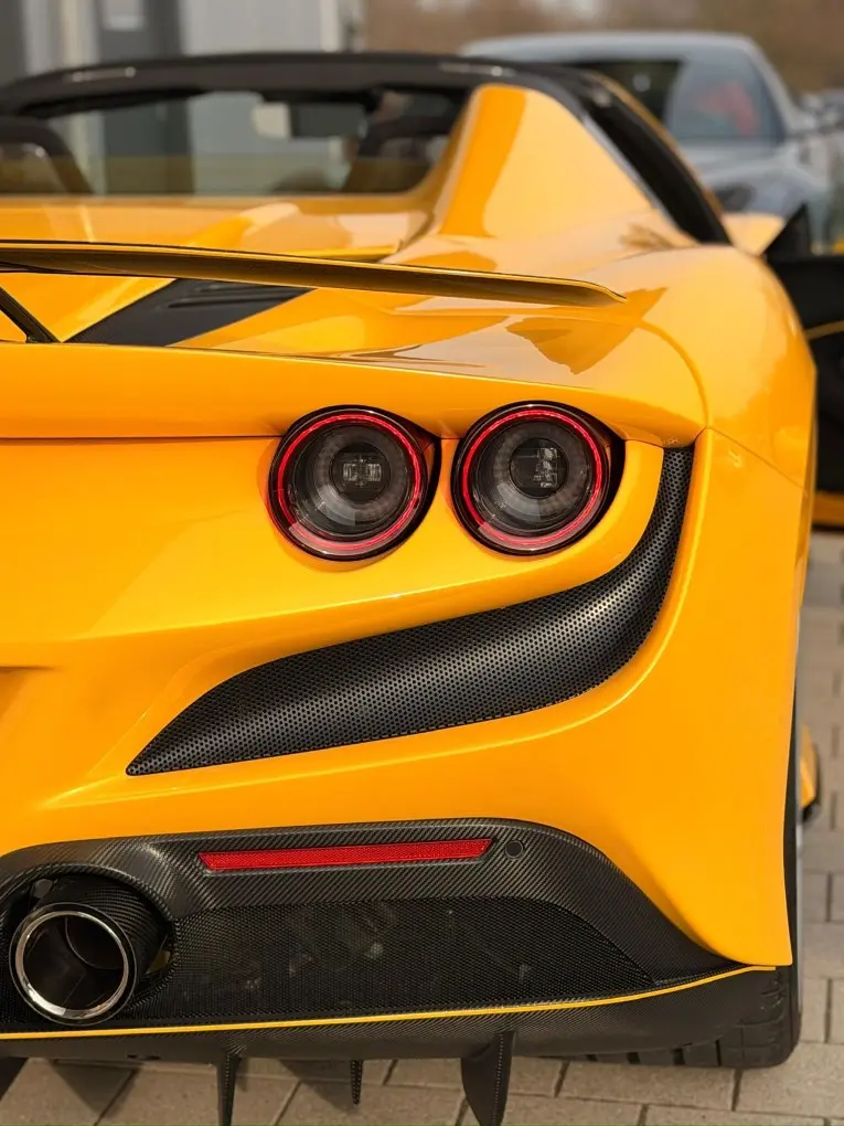 Ferrari F8 SPIDER 2023, front view — Cannes Lux Car Rental, Cannes. Ferrari F8 SPIDER in Cannes Ferrari F8 SPIDER rental in Cannes secures a 2023 convertible…