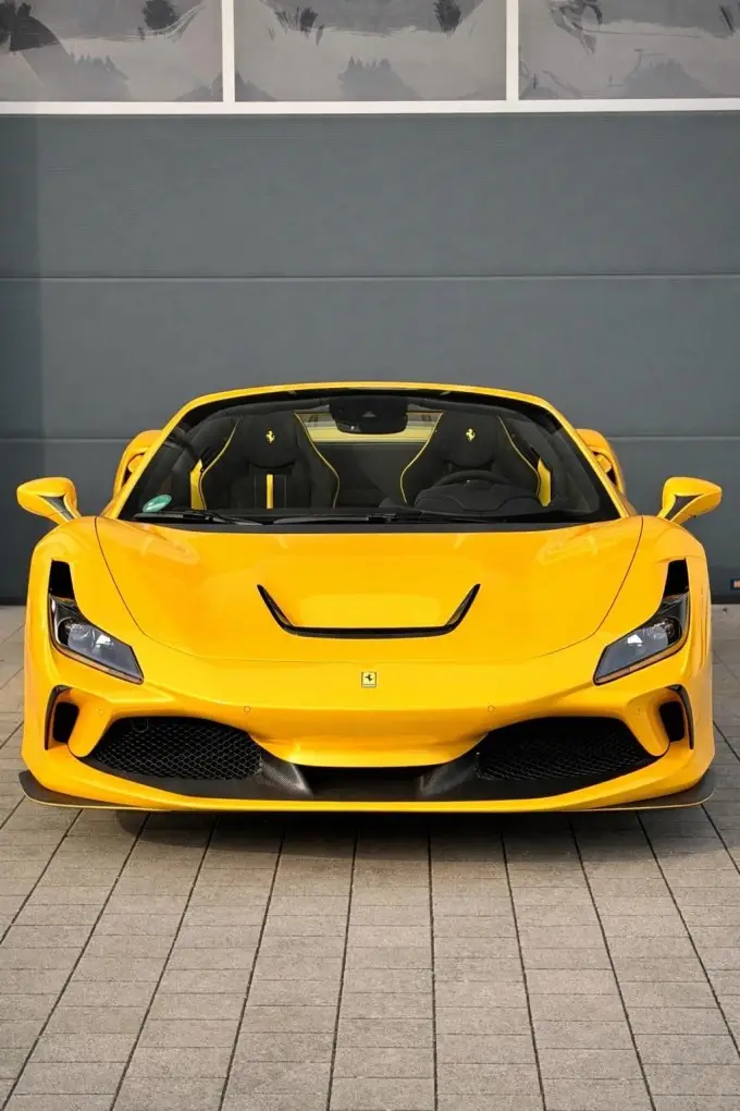 Ferrari F8 SPIDER 2023, rear view — Cannes Lux Car Rental, Cannes. Ferrari F8 SPIDER in Cannes Ferrari F8 SPIDER rental in Cannes secures a 2023 convertible…
