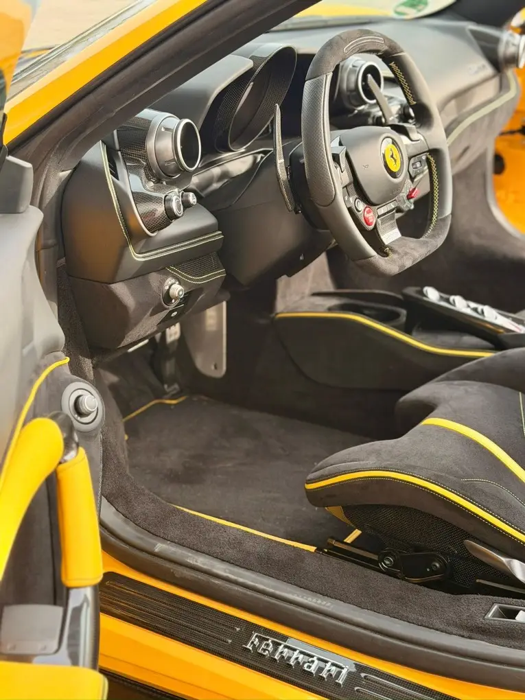 Ferrari F8 SPIDER 2023, interior — Cannes Lux Car Rental, Cannes. Ferrari F8 SPIDER in Cannes Ferrari F8 SPIDER rental in Cannes secures a 2023 convertible…