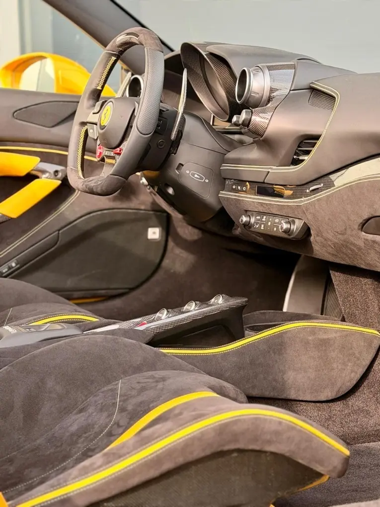 Ferrari F8 SPIDER 2023, dashboard — Cannes Lux Car Rental, Cannes. Ferrari F8 SPIDER in Cannes Ferrari F8 SPIDER rental in Cannes secures a 2023 convertible…