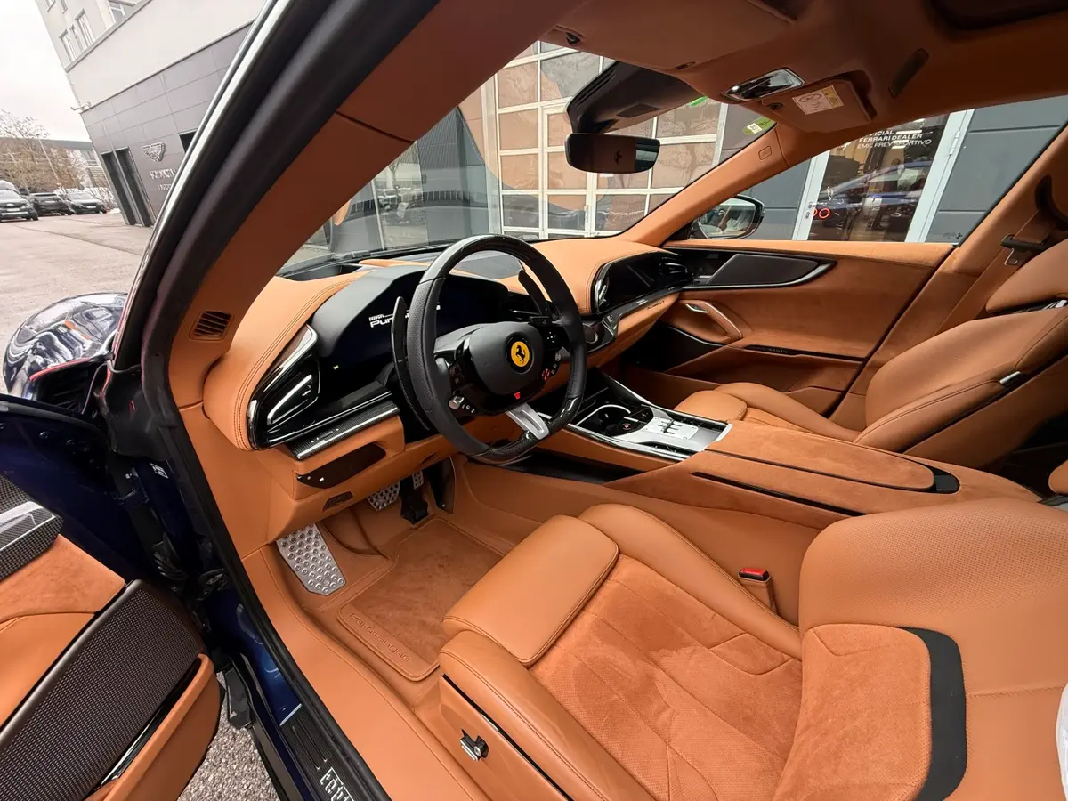 Ferrari Purosangue 2024, rear view — Cannes Lux Car Rental, Cannes. Ferrari Purosangue in Cannes Ferrari Purosangue rental in Cannes provides access to a…