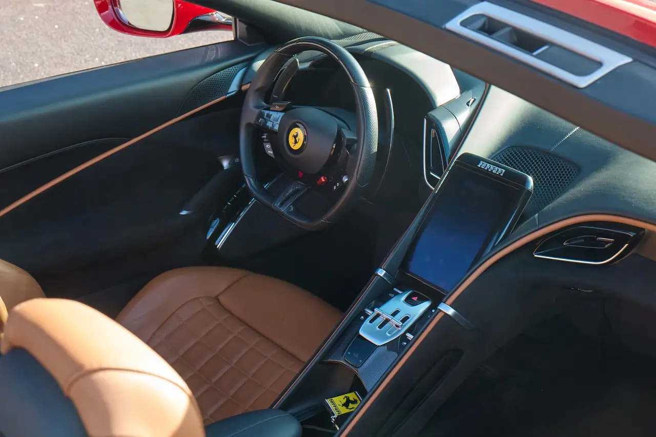 Ferrari Roma Spider 2024, rear view — Cannes Lux Car Rental, Cannes. Ferrari Roma Spider in Cannes Ferrari Roma Spider hire in Cannes offers a 2024…