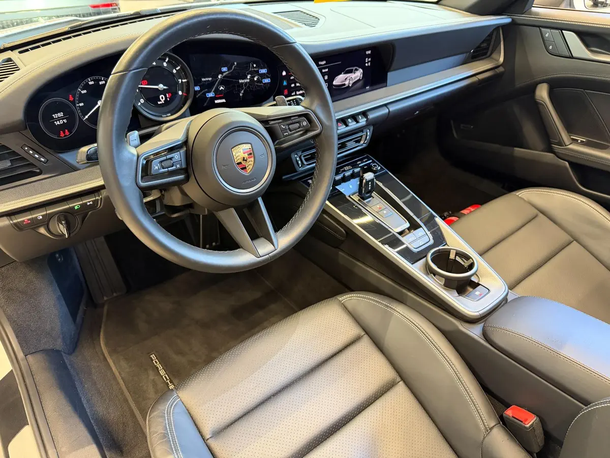 Porsche 911 Carrera S Cabrio (992) 2025, front view — Cannes Lux Car Rental, Cannes. Porsche 911 Carrera S Cabrio (992) in Cannes Porsche 911 Carrera S Cabrio (992) rental in…