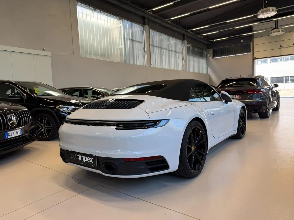 Porsche 911 Carrera S Cabrio (992) 2025, side profile — Cannes Lux Car Rental, Cannes. Porsche 911 Carrera S Cabrio (992) in Cannes Porsche 911 Carrera S Cabrio (992) rental in…