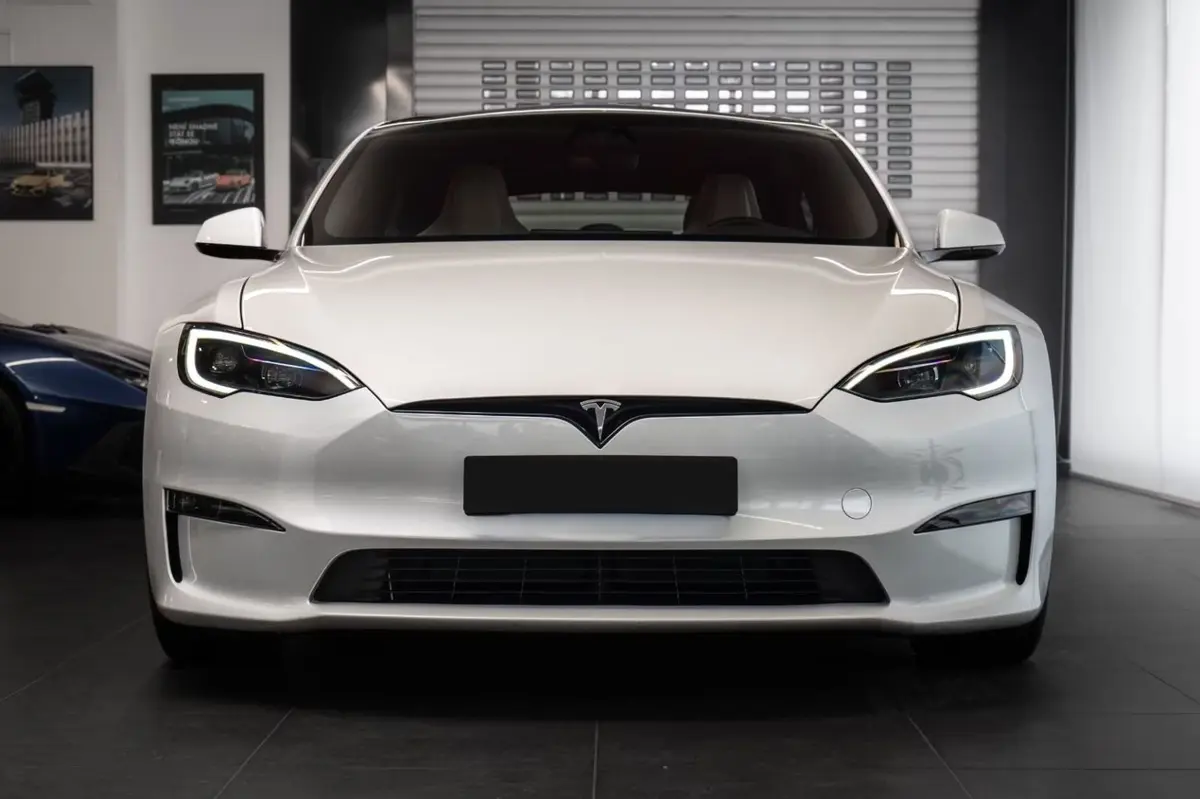 Tesla Model S Plaid 2025, side profile — Cannes Lux Car Rental, Cannes. Silent instant power for the Monaco business run